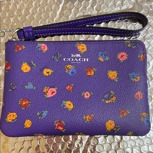 Coach Purple Floral Wristlet.   6950